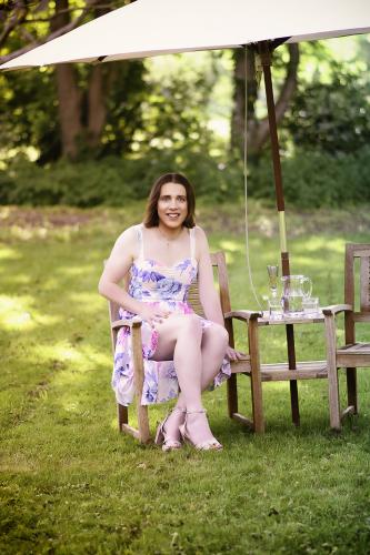 Courtney in her patterned dress