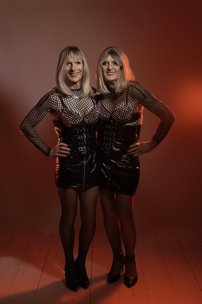 Nia and Sandra in punk look, red backlighting