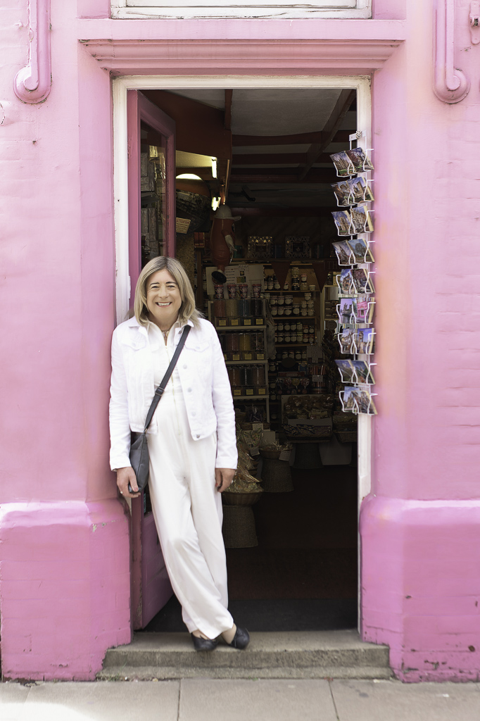 Nicola in pink shop doorway
