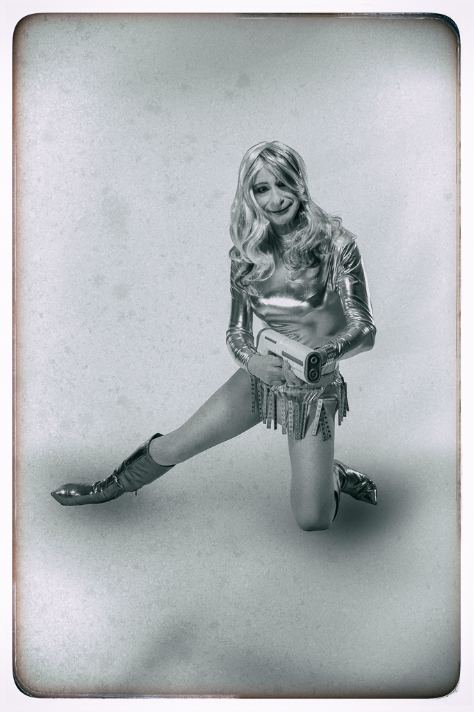 Black and white retro-style photo of Rachel Anya as Barbarella with a 1960s period look