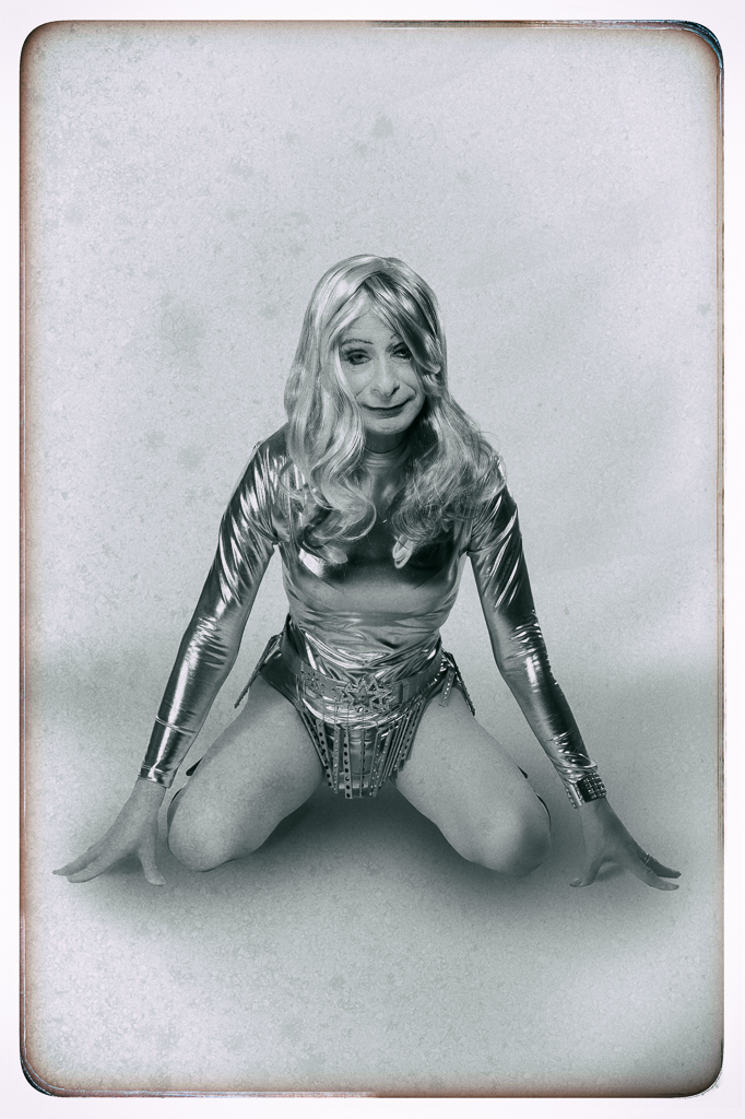 Black and white retro-style photo of Rachel Anya as Barbarella with a 1960s period look